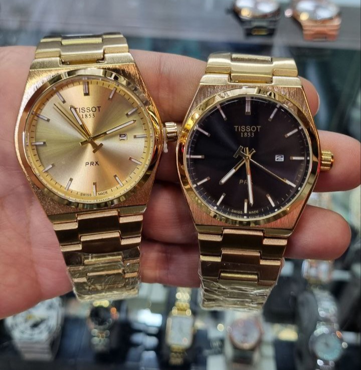 ساعت مچی مردانه تیسوت مدل PRX طلایی صفحه مشکی